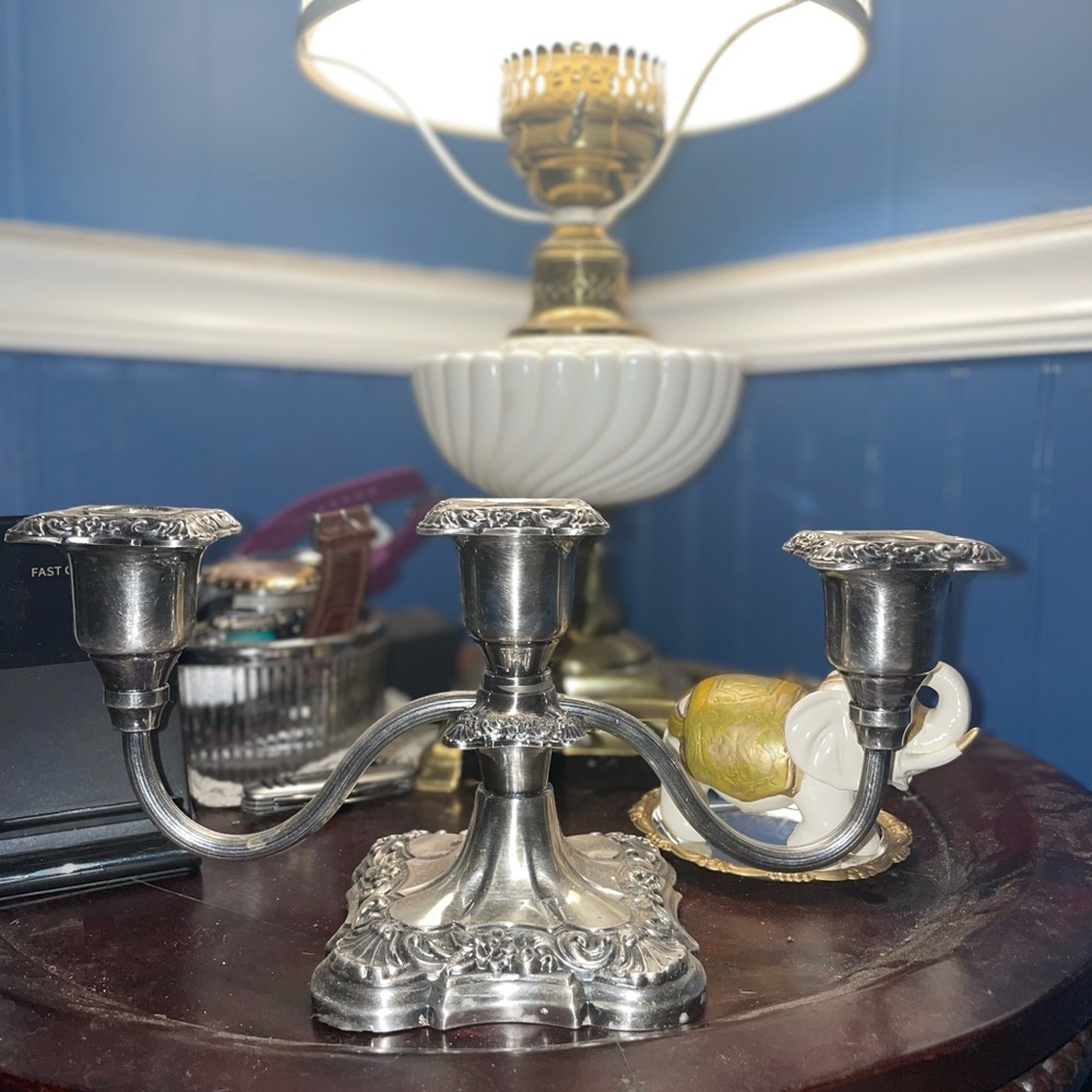 Matching set of silver candle holders.